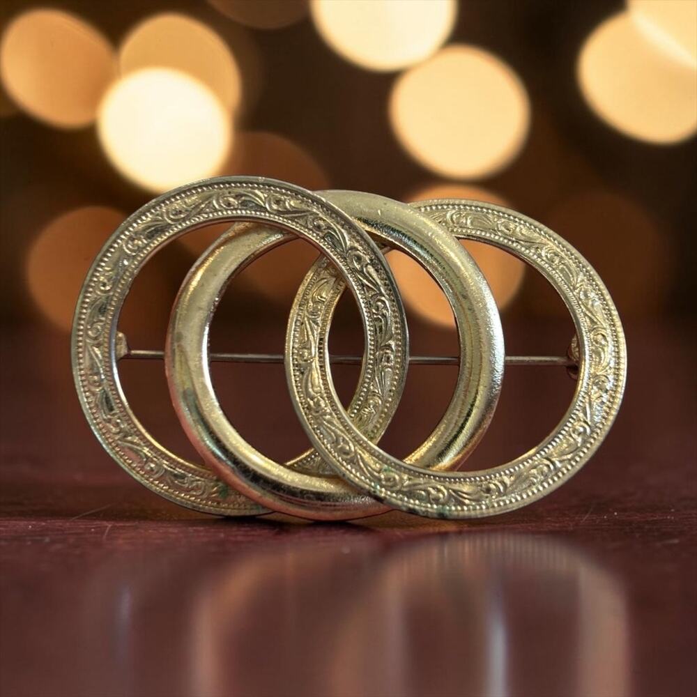 Vintage Gold Tone Interlocking Rings Brooch Engraved Ornate Circle Statement Pin